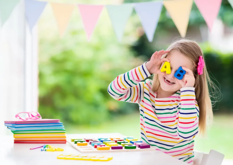 Child painting with paintbrush